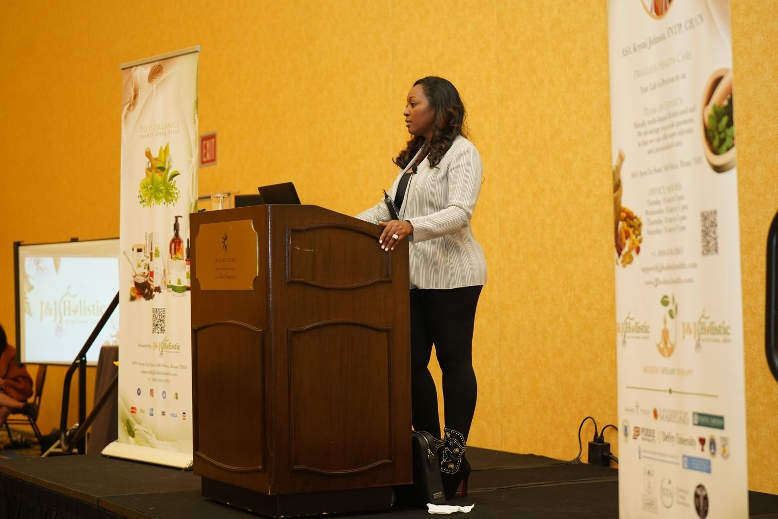 Krystal Johnson speaking at a health and wellness conference